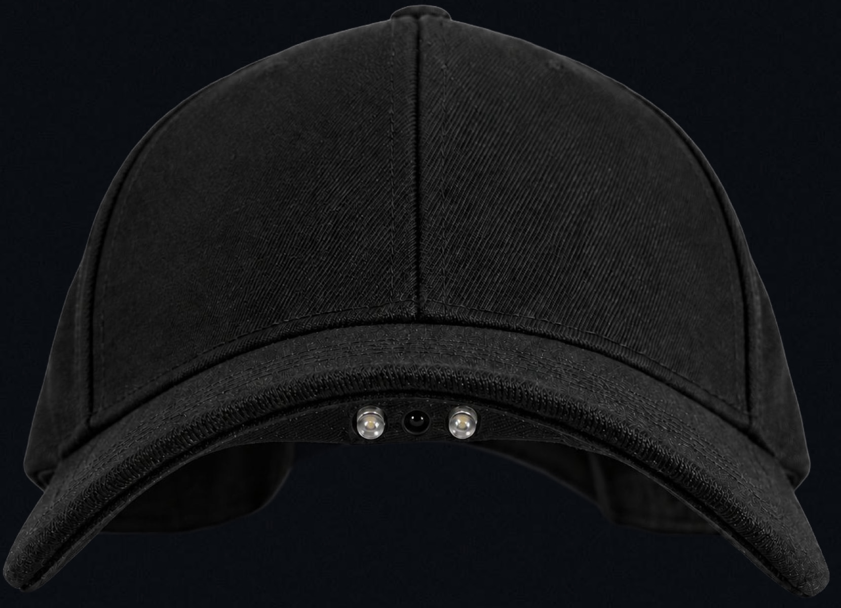 A black baseball cap seen from the front, with two small emitters and a sensor set under the brim