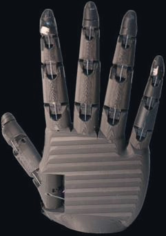 An assembled gray 3D-printed hand, back view, fingers extended, print lines visible